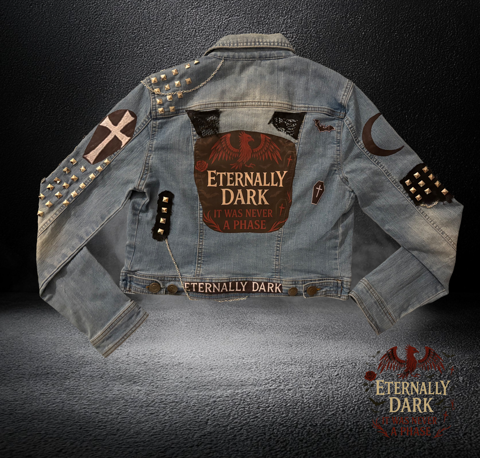 Denim jacket with 'Eternally Dark' branding on a dark background